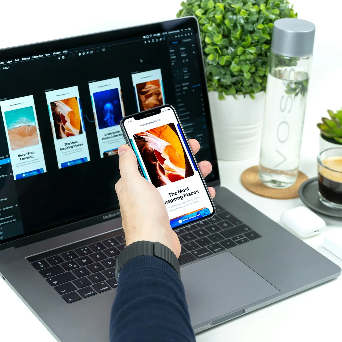 Person holding a smartphone displaying a website interface